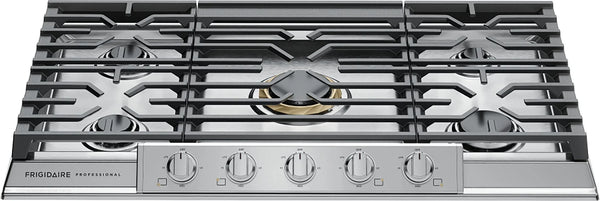 Stainless steel gas cooktop with multiple burners and control knobs on a white background