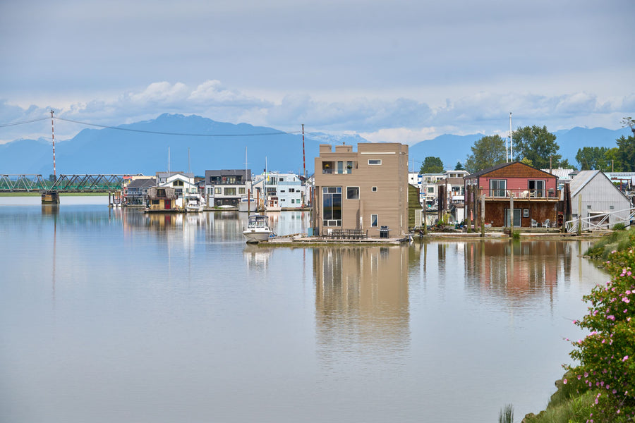 Floating homes along the Fraser River in Ladner, Delta, British Columbia