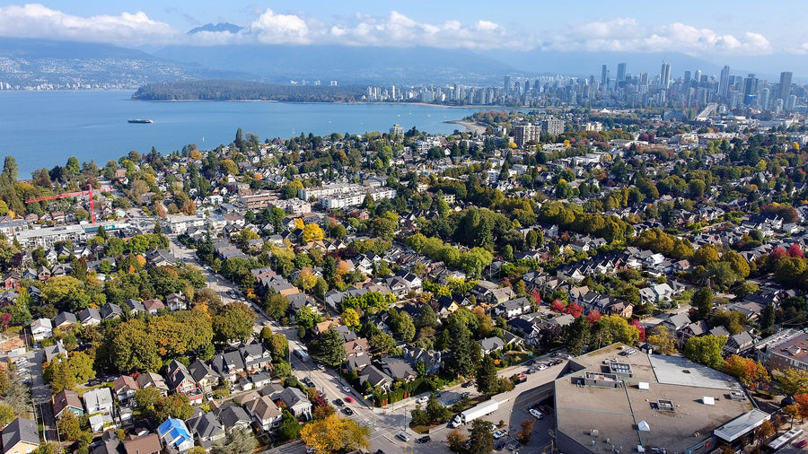 Aerial view of Vancouver neighbourhoods, False Creek and the downtown skyline in British Columbia